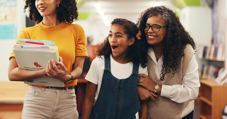 Excited, grandma and parent in library with child for bonding together, book choice and development. Happy people, mother and daughter in bookshop for literature, storytelling and knowledge support.