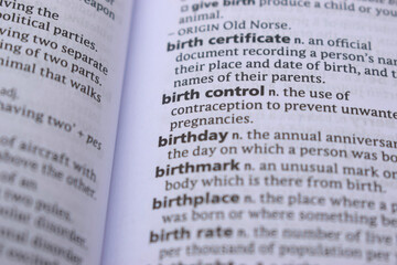 English Dictionary Page Close Up With the Word Of -birth control