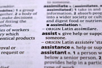 Fototapeta premium English Dictionary Page Close Up With the Word Of -assist