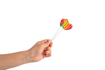 Sweets, lollipops in hand, on transparent background