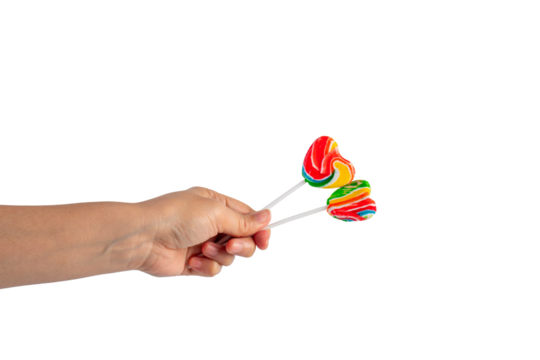 Sweets, lollipops in hand, on transparent background
