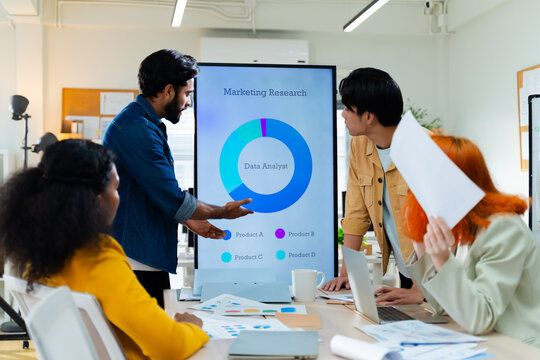 Group of Multiracial creative business brain storm meeting presentation,discussing roadmap to product launch, planning,strategy,new business development,working with new startup project in office.