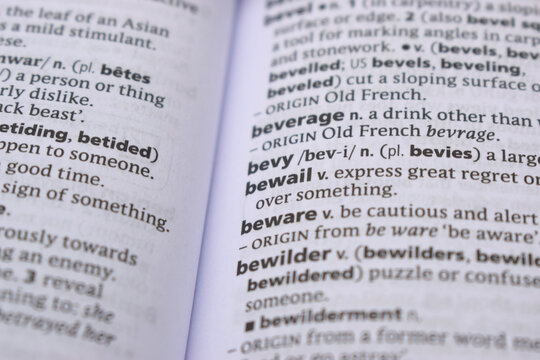 Close Up Of English Dictionary Page With Word - bewail