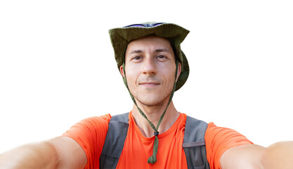 Man on a journey wearing a hat, smiling at camera, making a selfie. Isolated portrait on white background