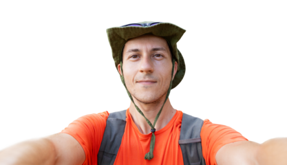 Man on a journey wearing a hat, smiling at camera, making a selfie. Isolated portrait on white background