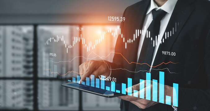 A business professional analyzes financial data on a tablet in a contemporary office setting, showcasing dynamic graphs and charts for investment insights. Scalp - Powered by Adobe