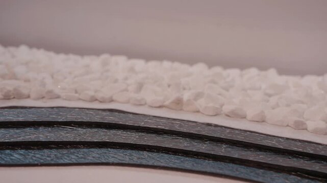 White stones and textured layers create a calming abstract landscape