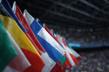 Colorful flags stadium international crowd celebration flutter in vibrant unity