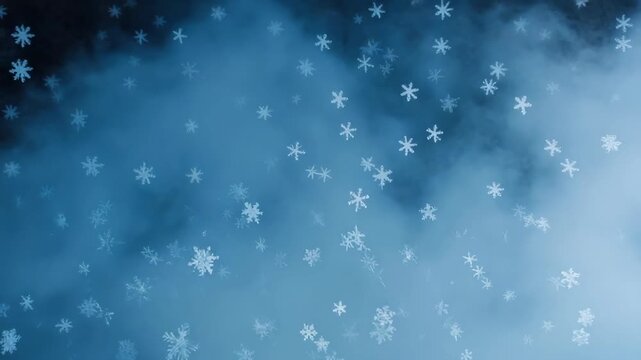 Numerous delicate snowflakes scattered across a misty blue background with soft focus winter cold