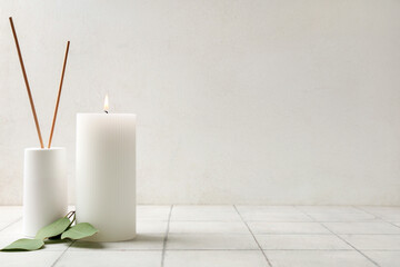 Burning Candle With Eucalyptus And