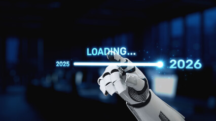 A robotic hand points at a glowing loading bar, illustrating the passage between the years 2025 and 2026 in a modern office setting, symbolizing technological progress. Synapse