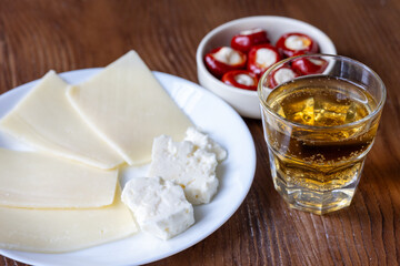 Close-Up of White Wine and Cheese Plate
