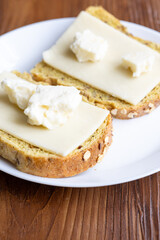 Close-Up of European Cheeses on Bread