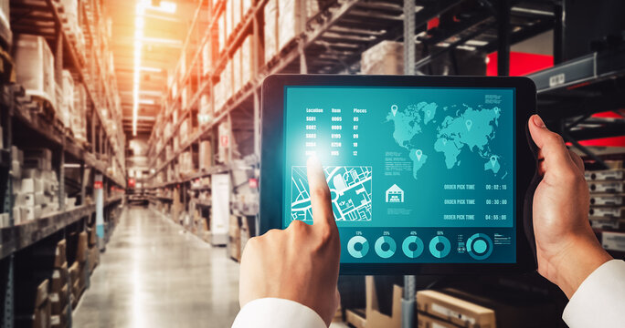 Warehouse management innovative software in computer for real time monitoring of goods package delivery . Computer screen showing smart inventory dashboard for storage and supply chain distribution .
