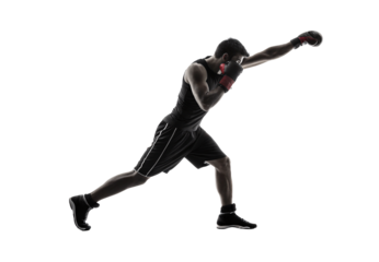 Male boxer in athletic stance executing powerful punch in silhouette with boxing gloves, isolated on a transparent background