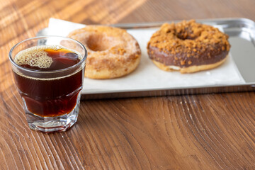 Close-Up of Donuts with a Shot of Espresso