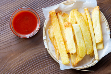 Close-Up of Jumbo Fries with Ketchup
