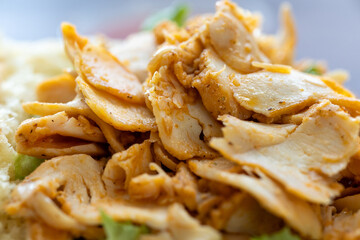 Close-Up of Turkish Chicken Doner Served with French Fries in Bread
