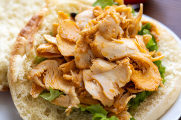 Close-Up of Turkish Chicken Doner Served with French Fries in Bread
