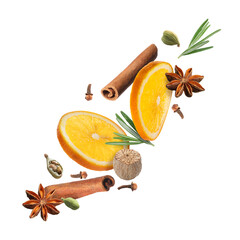 Mulled wine ingredients: orange slices and spices falling on white background. Traditional...