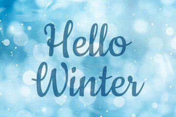 Hello winter card with snow on blue gradient background and bokeh lights