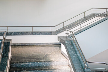 Modern, bright interior with marble and metal trim