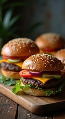 Hamburgers on a cutting board with lettuce and tomato