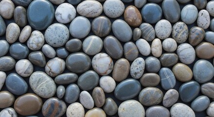Smooth river stones create a natural and calming background texture.
