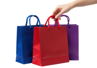 Isolated colorful shopping bags, hand holding a gift bag, retail therapy, consumerism, gift-giving