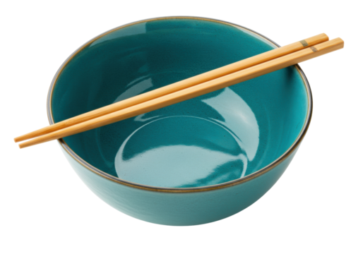 Isolated turquoise ceramic bowl with wooden chopsticks, a modern kitchenware concept