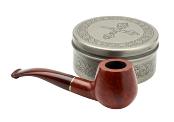 Isolated tobacco pipe next to metal snuff box with Christian cross symbol on the lid studio shot