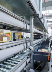 packing line in a logistics warehouse. conveyor belt in a modern production line