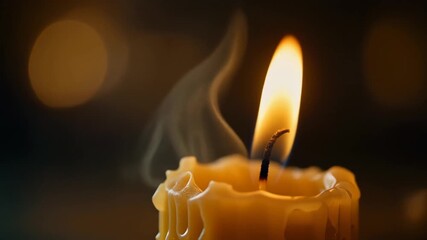 Macro candle flame flickering softly in dark cinematic ambiance showing warmth and focus on details - Powered by Adobe
