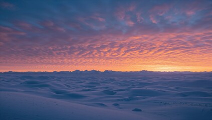 Sunset illuminating a snowy landscape, highlighting seasonal change