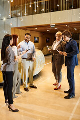 Business professionals collaborate in a modern office setting during a productive meeting