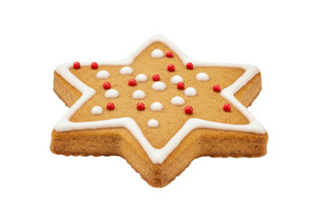 Isolated star-shaped gingerbread cookie with white icing and red and white decorative candies