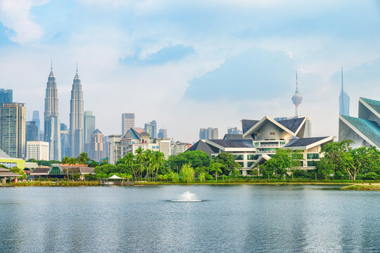 Awesome Kuala Lumpur skyline. Scenic lake and fountains