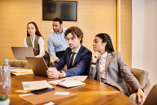 Professionals collaborating in a modern office setting for innovative business solutions