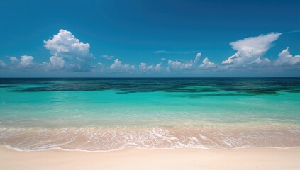 Fototapeta premium Shades of blue water at a pristine beach, a serene backdrop for relaxation