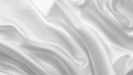 Naklejka premium Smooth white satin fabric backdrop featuring shine and folds, ideal for elegant presentations