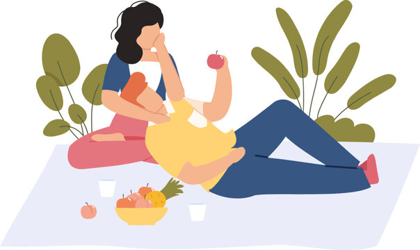 Couple enjoying picnic outdoors eating healthy fruit
