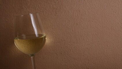 Fototapeta premium White Wine Poured Into A Glass, Suitable As A Background For Text