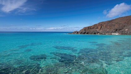 Fototapeta premium Serene lagoon, expansive vista of tranquil blue waters and rugged volcanic formations, seasonal change