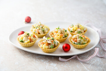 Traditional Russian salad served in tartlets