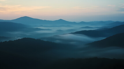Obraz premium Misty Mountain Range at Dawn