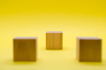 An isolated wooden cube with customizable space for text or ideas. Copy space concept.