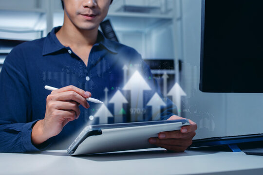 Financial Analyst Analyzing Stock Market Data and Growth Charts on Digital Tablet with Stylus, Concept of Investment Strategy, Global Economy Success, Future Fintech Technology, and Business Planning.