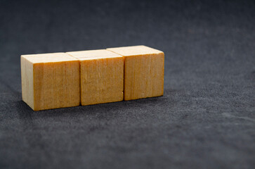 Wooden cubes with customizable space for text or ideas.