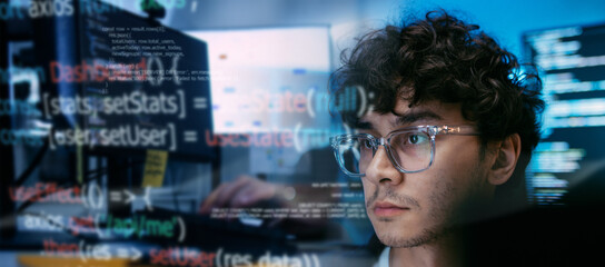 Professional Male Software Developer Working on Computer Screen, Showing Digital Programming Code, Frontend Web Development, Concept of IT Engineering, Modern Technology, and Deep Analysis in office.