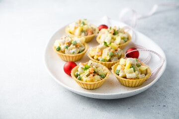 Traditional Russian salad served in tartlets